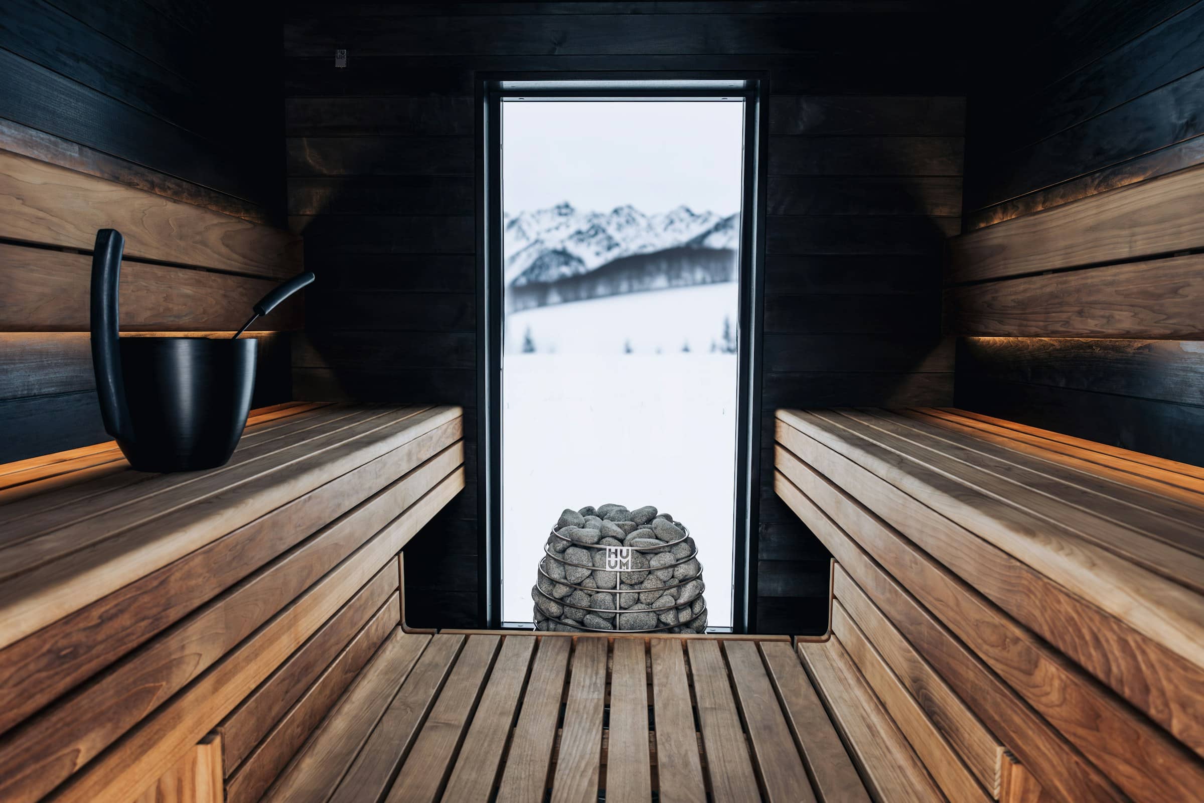 The Sauna: Wood-fired, built into the rock.